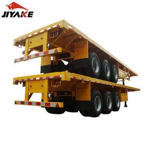 Semi-remorque à conteneur à plat 2 3 4 essieux neuves et d'occasion remorques <span class=keywords><strong>de</strong></span> camion <span class=keywords><strong>en</strong></span> acier avec pneu 12R22.5 pour le <span class=keywords><strong>transport</strong></span> <span class=keywords><strong>de</strong></span> véhicules disponibles - Product Image 1