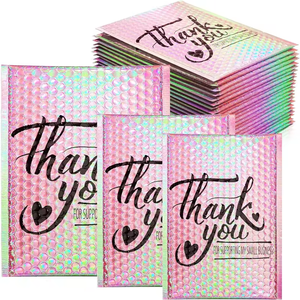 Bolsas de polietileno ecológicas reciclables con impresión en lámina dorada para envíos de ropa. - Product Image 1