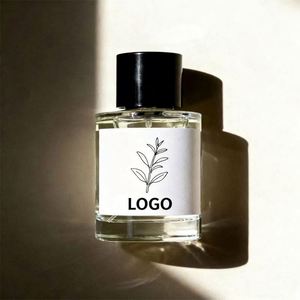 Flacon de parfum en verre transparent minimaliste personnalisé avec bouchon noir, idéal pour les parfums naturels de 30 ml à 100 ml et l'emballage écologique - Product Image 1
