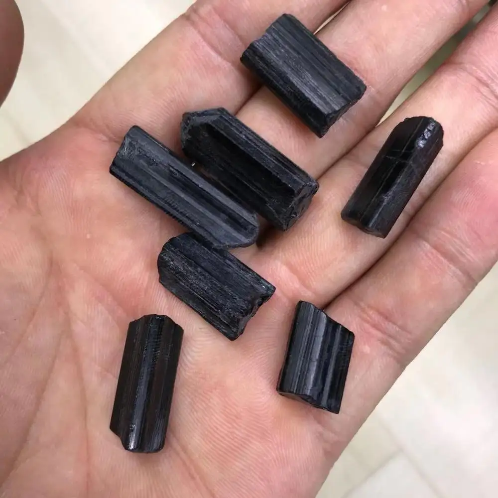 Turmalina natural negra con piedra rodante para mejorar el efecto de autorcuración, venta al por mayor