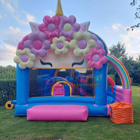 Château gonflable avec toboggan, design cupcake rose, usage commercial, matériau PVC, capacité 500 kg, portable, garantie 3 ans