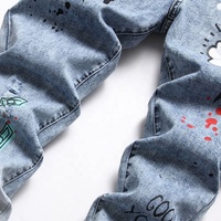Jeans slim déchirés pour hommes, coupe droite, effet délavé, imprimé graffiti, style hip-hop, denim, streetwear, vente en gros, personnalisable OEM