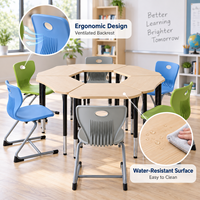 Ensemble de tables scolaires hexagonales modulaires et empilables avec chaises en plastique pour les discussions de groupe en classe