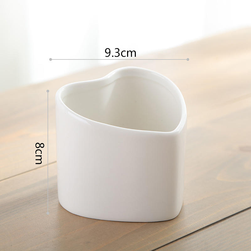 Vaso di fiori con cuore di pesca