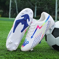 Chaussures de football à crampons longs 2026, semelle extérieure antidérapante en TPU, tige en PVC, doublure en maille, crampons d'entraînement de football unisexes pour jeunes, vente en gros
