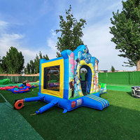 Château gonflable bleu pour location événementielle, château gonflable extérieur avec toboggan, château de saut pour enfants motif chien de dessin animé à vendre
