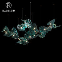 Lustre en verre de luxe, style artistique nordique, pour hall d'hôtel, hall d'entrée, design en métal et verre, éclairage LED, feuilles de lotus émeraude