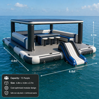 Île flottante gonflable géante pour parc aquatique avec toboggan, canapé-lit et table intégrés, idéale pour la location en complexe hôtelier – Direct Usine