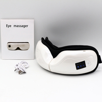 Nouveau mini masque de massage oculaire pliable à haute fréquence de vibration et pression thermique avec 6 modes de chauffage et de musique pour soulager la fatigue oculaire