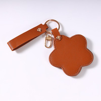 Miroir de maquillage en PU haut de gamme personnalisé européen et américain avec fleur rotative, portable pour voyage, porte-clés.