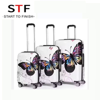Bagage à main de luxe en gros personnalisé PC coque dure 14/20/24/28 pouces papillon imprimé bagages sacs de voyage 4 pièces ensemble de valise
