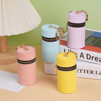 Nouvelle mode : Étui à rouge à lèvres cylindrique élégant et minimaliste, porte-monnaie portable en cuir PU pour femme