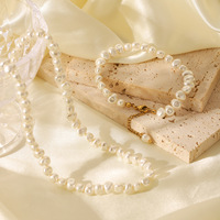 Ensemble collier et bracelet en acier inoxydable imitation perle de style français transfrontalier pour femmes, plaqué or 18 carats