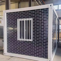 Maison conteneur préfabriquée démontable avec escalier extérieur en panneaux sandwich