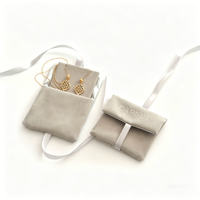 Pochette à bijoux en suède avec insert pour collier, logo personnalisé en relief, prix d'usine