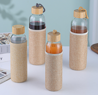 Gobelet à eau en verre isolé résistant à la chaleur moderne de 500 ml, très vendu, réutilisable, avec couvercle en bambou à visser, housse en lin, anti-fuite