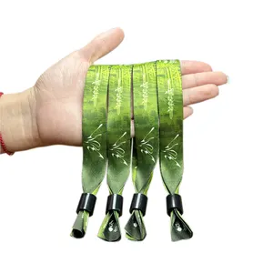 促销定制节日织物手链编织腕带，带可调节塑料夹腕带，用于活动派对