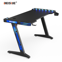 Bureau d'ordinateur de jeu moderne en bois de haute qualité avec surface en mélamine, éclairage RGB et porte-gobelet