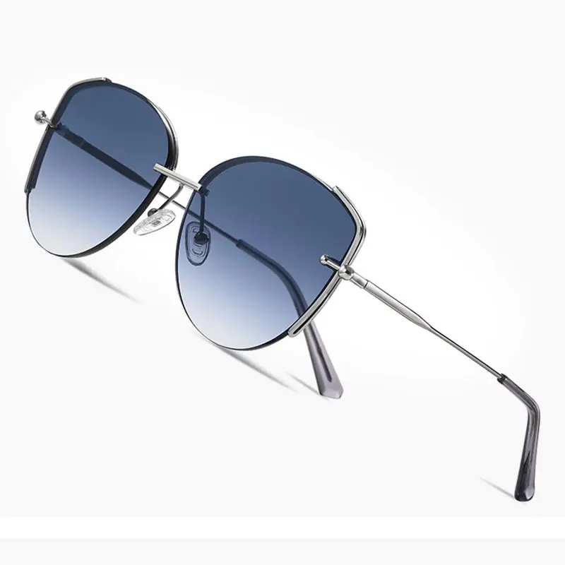Óculos de sol premium elegantes com lentes gradientes, óculos de sol femininos de moda moderna olho de gato sem aro