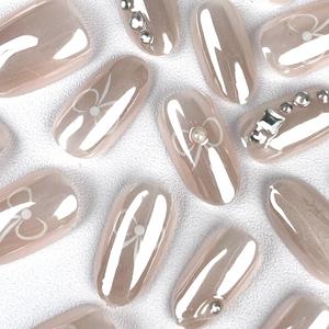 <span class=keywords><strong>Uñas</strong></span> postizas de calidad profesional, <span class=keywords><strong>color</strong></span> <span class=keywords><strong>rosa</strong></span> <span class=keywords><strong>pastel</strong></span> brillante, cromo, con lazo blanco ovalado y decoración de diamantes. - Product Image 5