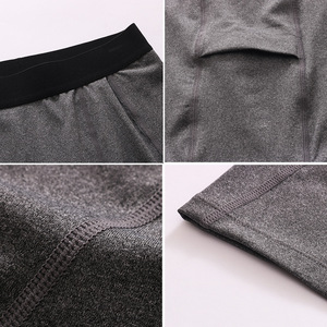 Shorts de sport compressifs pour hommes avec poches, pour la course à pied, l'entraînement, extensibles, respirants et à séchage rapide - Product Image 4