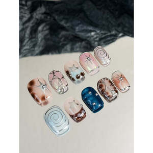 Dream Spiral Press-on Nail Art : Améliorez votre style d'ongles avec un design en spirale rêveuse - Product Image 2