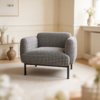 Fauteuil contemporain de style nordique en tissu vert foncé avec pieds en métal noir pour chaises de salon