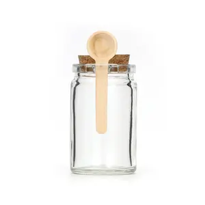 Hot sale 100ml 250ml 4oz 8oz empty clear single ear bath salt spice glass bottle jars with cork and spoon