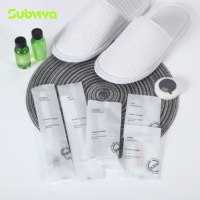 Kit d'articles de toilette d'hôtel portable imprimé sur mesure, emballage non tissé, ensemble d'accessoires jetables pour les chambres d'hôtel