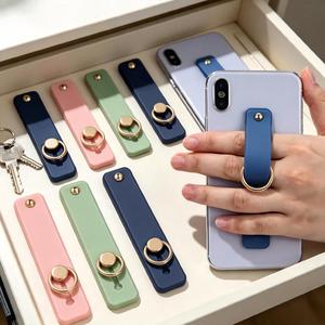 สายรัดโทรศัพท์ Cobee 5 ชิ้น - สายรัดนิ้วซิลิโคน ใช้ติดกับเตียงได้ พร้อมเทปกาว (สีดำ น้ำเงิน ชมพู เขียว เทา) - Product Image 4