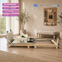 Reformer de Pilates pliable en chêne massif avec structure de poutre repliable, conception peu encombrante pour la maison, idéal pour les séances de Pilates privées et l'entraînement quotidien