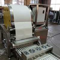 Machine automatique haute performance pour la fabrication de feuilles de rouleaux de printemps en acier inoxydable 304, également idéale pour les crêpes soufflées et les enveloppes de raviolis
