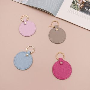 Stylish Colorful PU Leather Diaper Bag Keychain Round Leatherette Keychain Fashion Leather Round Keytag Logo Keychain <b>for</b> <b>Gifts</b> - Product Image 2