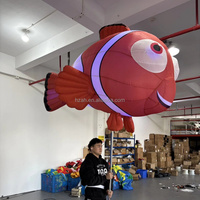 Grand ballon publicitaire gonflable en forme de poisson tropical en tissu Oxford avec lumière LED et taille personnalisée pour défilé et spectacle