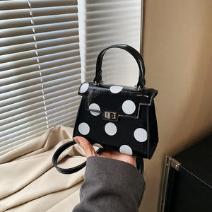中国供应商2025新到女性时尚小圆点手袋女孩迷你手袋ins热卖女士口红包 - Product Image 2