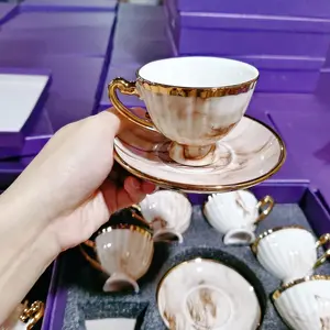 Toptan lüks mermer tasarım fantezi kahve fincanları ve altlık kemik çini güzel porselen çay kahve kupası kupa altın jant ile