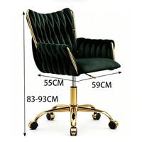 Fauteuil lounge en velours avec dossier capitonné, assise rembourrée, accoudoirs incurvés et base à cinq étoiles pour salon et chambre