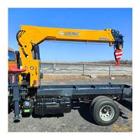 Prix usine 4 tonnes grue à flèche articulée camion HOWO avec grue télécommande grue de levage hydraulique pour bâtiment de ferme
