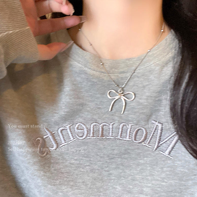 สร้อยคอกระดูกไหปลาร้าโบว์สีเงิน