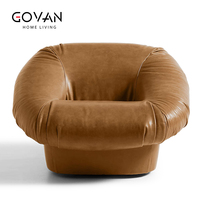 Fauteuil pivotant en cuir de style moderne, adapté aux salons, aux zones de détente et aux locaux commerciaux