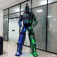 Costume de performance robot LED rose sur échasses, mascotte lumineuse en EVA, personnalisé pour l'ambiance de mariage, de carnaval ou de fête