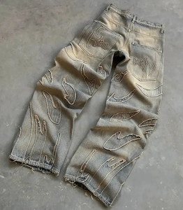 بنطلون جينز رجالي بتصميم عصري مزين بالرقع وقابل للتخصيص، مصنوع من القطن بنسبة 100%، بقصة فضفاضة ولون باهت ملائم لأزياء الشارع - Product Image 2