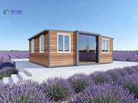 Maison conteneur extensible de 20 pieds, écologique, avec fenêtres panoramiques pour une retraite de vacances immersive en forêt