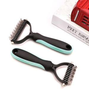Pet Knot Comb Grooming Tpr Pet Brusher para perros y gatos - Product Image 2