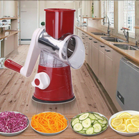 Hete Aanbieding Multifunctionele Keukenhulp, Voedselveilige Handmatige Fruit- en Groentesnijder, Kleurrijke Trommelhakselaar, Verpakt in Karton