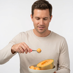 Coupe-melon intelligent en acier inoxydable avec poignée rouge, facile à nettoyer, outil manuel pour fruits et légumes JAYA MATA JM104 - Product Image 1