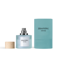 Bouteille de parfum ronde en verre de luxe de 50ml 100ml avec couvercle en bois et capacités de la boîte 30ml 50ml 100ml
