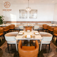Canapé en cuir de luxe moderne, chaise rembourrée, base en acier inoxydable, ensemble de table en marbre pour café, restaurants, hôtel, steak-house