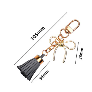 Nouveau <span class=keywords><strong>Pendentif</strong></span> Porte-clés en Alliage avec Nœud Papillon et Pompon en Cuir Doré/Argenté, Accessoire DIY pour Sac à Main Femme - Product Image 6