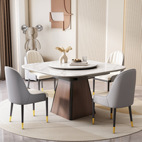 Modernes Luxus-Esstisch-Set aus Sinterstein, rund, mit goldenen Metallbeinen und Drehplatte für das Esszimmer der Villa